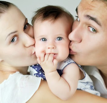 An image of a happy family of three